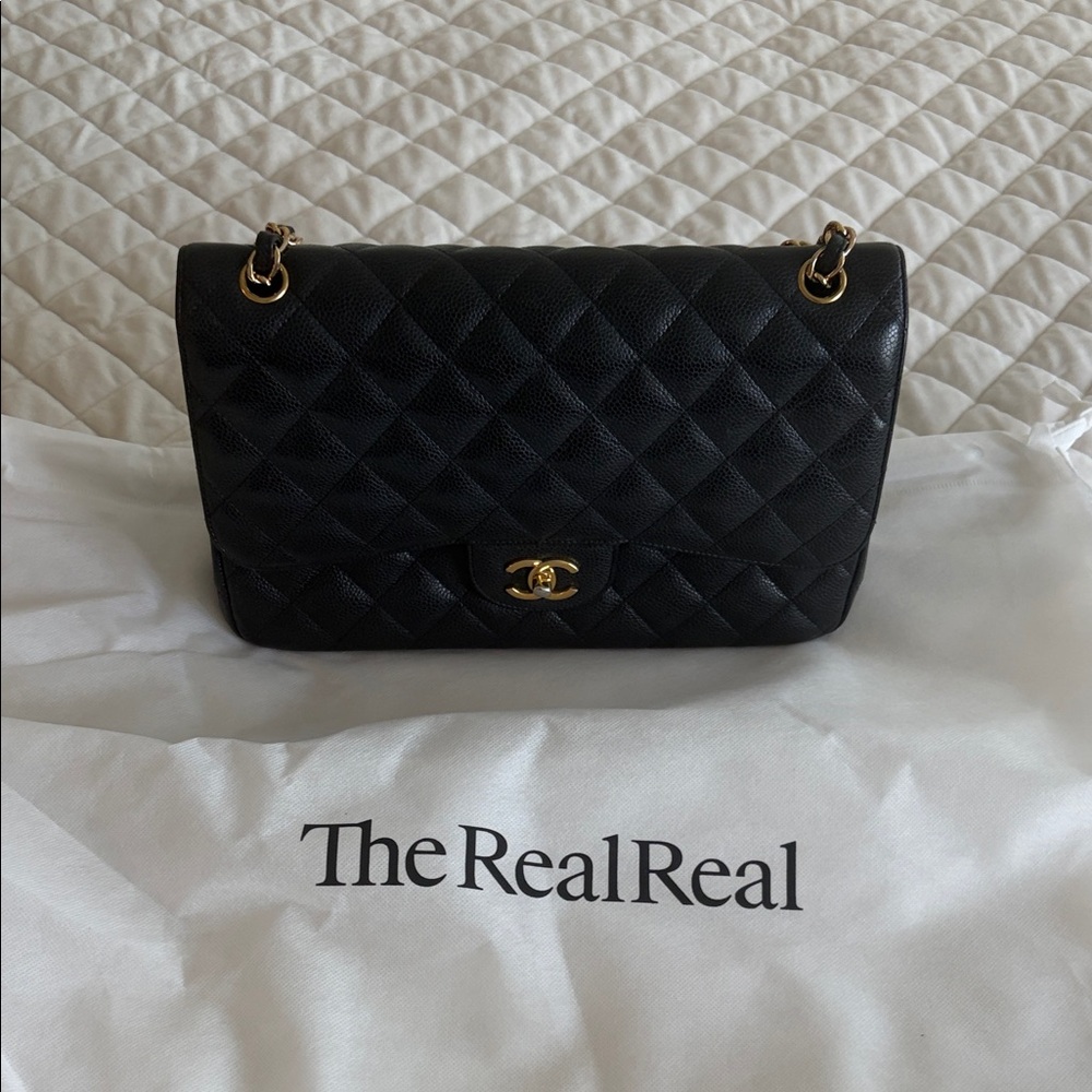 CHANEL Black Quilted Caviar Leather Shoulder Bag with Gold-Tone CC Closure